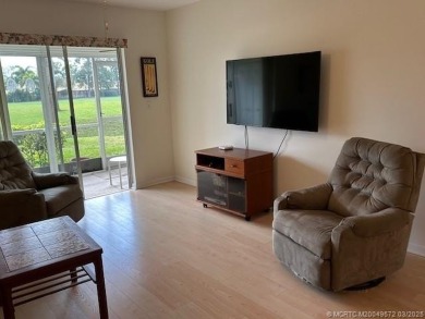 FIRST FLOOR CONDO WITH FANTASTIC VIEWS.   EAST SIDE OF PALM CITY on Monterey Yacht and Country Club in Florida - for sale on GolfHomes.com, golf home, golf lot