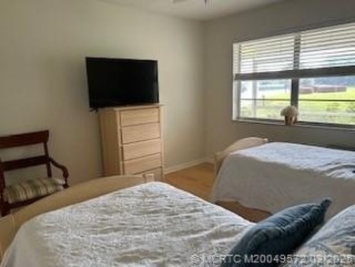 FIRST FLOOR CONDO WITH FANTASTIC VIEWS.   EAST SIDE OF PALM CITY on Monterey Yacht and Country Club in Florida - for sale on GolfHomes.com, golf home, golf lot