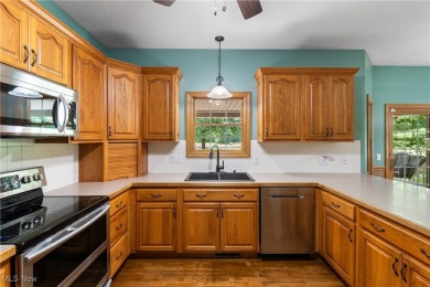 Welcome to 6180 Edison St in Hartville, Ohio - a stunning, solid on Sable Creek Golf Course in Ohio - for sale on GolfHomes.com, golf home, golf lot