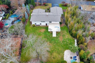 This charming 5-bedroom, 2-bath, ranch-style home is located on on Manasquan River Golf Club in New Jersey - for sale on GolfHomes.com, golf home, golf lot