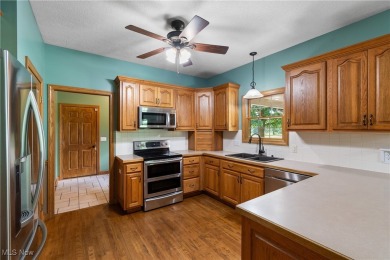Welcome to 6180 Edison St in Hartville, Ohio - a stunning, solid on Sable Creek Golf Course in Ohio - for sale on GolfHomes.com, golf home, golf lot