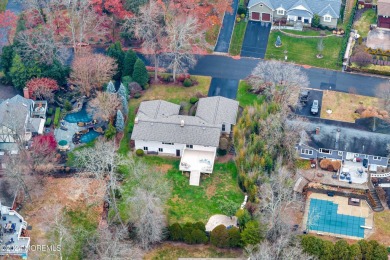 This charming 5-bedroom, 2-bath, ranch-style home is located on on Manasquan River Golf Club in New Jersey - for sale on GolfHomes.com, golf home, golf lot