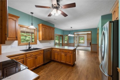 Welcome to 6180 Edison St in Hartville, Ohio - a stunning, solid on Sable Creek Golf Course in Ohio - for sale on GolfHomes.com, golf home, golf lot