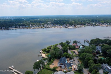 This charming 5-bedroom, 2-bath, ranch-style home is located on on Manasquan River Golf Club in New Jersey - for sale on GolfHomes.com, golf home, golf lot