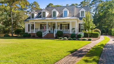 This exceptional home blends timeless Southern charm with on Lockwood Folly Country Club in North Carolina - for sale on GolfHomes.com, golf home, golf lot