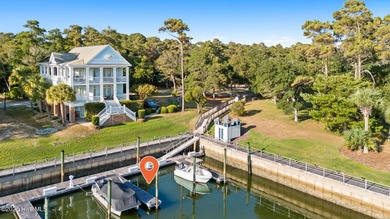 This exceptional home blends timeless Southern charm with on Lockwood Folly Country Club in North Carolina - for sale on GolfHomes.com, golf home, golf lot