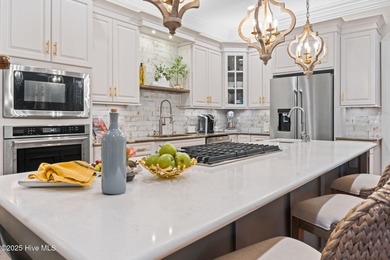 This exceptional home blends timeless Southern charm with on Lockwood Folly Country Club in North Carolina - for sale on GolfHomes.com, golf home, golf lot