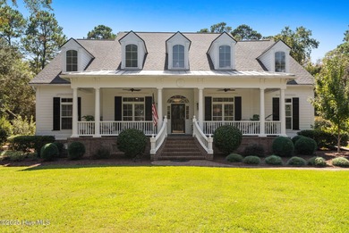 This exceptional home blends timeless Southern charm with on Lockwood Folly Country Club in North Carolina - for sale on GolfHomes.com, golf home, golf lot