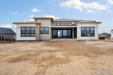 New home on a beautiful one-acre homesite! Past the entry is the on Raindance National Golf Course in Colorado - for sale on GolfHomes.com, golf home, golf lot