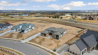 New home on a beautiful one-acre homesite! Past the entry is the on Raindance National Golf Course in Colorado - for sale on GolfHomes.com, golf home, golf lot