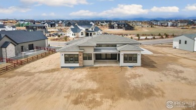 New home on a beautiful one-acre homesite! Past the entry is the on Raindance National Golf Course in Colorado - for sale on GolfHomes.com, golf home, golf lot
