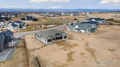 New home on a beautiful one-acre homesite! Past the entry is the on Raindance National Golf Course in Colorado - for sale on GolfHomes.com, golf home, golf lot