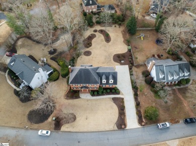 Welcome to 204 Medinah Drive located in Easley, SC. Nestled on a on Smithfields Country Club in South Carolina - for sale on GolfHomes.com, golf home, golf lot