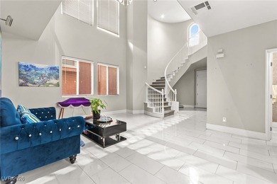 This beautifully renovated two-story home offers five bedrooms on Rhodes Ranch Golf Club in Nevada - for sale on GolfHomes.com, golf home, golf lot