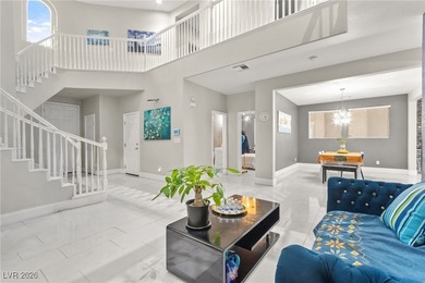 This beautifully renovated two-story home offers five bedrooms on Rhodes Ranch Golf Club in Nevada - for sale on GolfHomes.com, golf home, golf lot