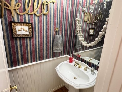 Experience luxury and comfort in this stunning ranch-style home on Cypress Creek Golfers Club in Virginia - for sale on GolfHomes.com, golf home, golf lot