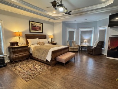 Experience luxury and comfort in this stunning ranch-style home on Cypress Creek Golfers Club in Virginia - for sale on GolfHomes.com, golf home, golf lot