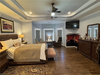 Experience luxury and comfort in this stunning ranch-style home on Cypress Creek Golfers Club in Virginia - for sale on GolfHomes.com, golf home, golf lot