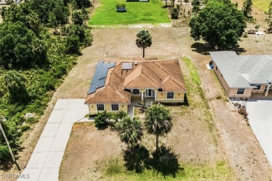 It's not every day you find a home where your backyard feels on Lehigh Resort Club in Florida - for sale on GolfHomes.com, golf home, golf lot