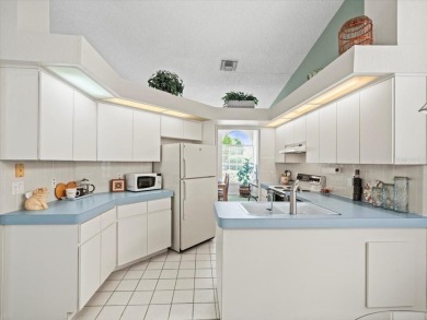 1990 Palmwood Grand Bahama maintained home on the 5th fairway of on Glen Lakes Country Club in Florida - for sale on GolfHomes.com, golf home, golf lot
