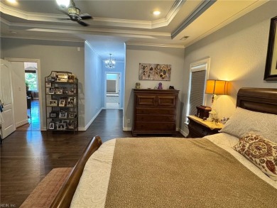 Experience luxury and comfort in this stunning ranch-style home on Cypress Creek Golfers Club in Virginia - for sale on GolfHomes.com, golf home, golf lot