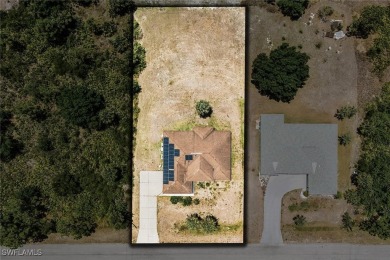 It's not every day you find a home where your backyard feels on Lehigh Resort Club in Florida - for sale on GolfHomes.com, golf home, golf lot