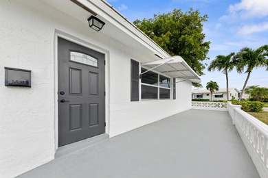 Single family home in Boynton's premier 55+ communitypletely on Leisureville Community Golf Course in Florida - for sale on GolfHomes.com, golf home, golf lot