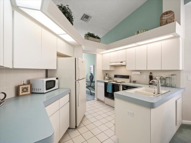 1990 Palmwood Grand Bahama maintained home on the 5th fairway of on Glen Lakes Country Club in Florida - for sale on GolfHomes.com, golf home, golf lot