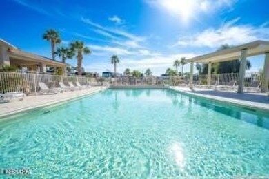 Beautiful park model has an addition added to it, giving you on The Refuge Golf and Country Club in Arizona - for sale on GolfHomes.com, golf home, golf lot