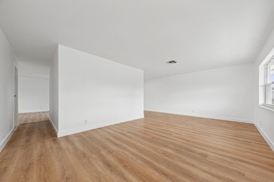 Single family home in Boynton's premier 55+ communitypletely on Leisureville Community Golf Course in Florida - for sale on GolfHomes.com, golf home, golf lot