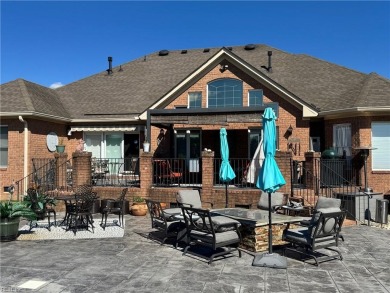 Experience luxury and comfort in this stunning ranch-style home on Cypress Creek Golfers Club in Virginia - for sale on GolfHomes.com, golf home, golf lot
