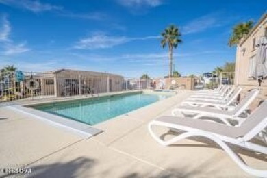 Beautiful park model has an addition added to it, giving you on The Refuge Golf and Country Club in Arizona - for sale on GolfHomes.com, golf home, golf lot