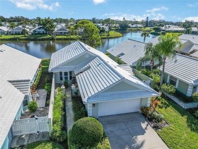 A peaceful waterfront gem wrapped in Florida charm.
Step into on Plantation Golf and Country Club in Florida - for sale on GolfHomes.com, golf home, golf lot