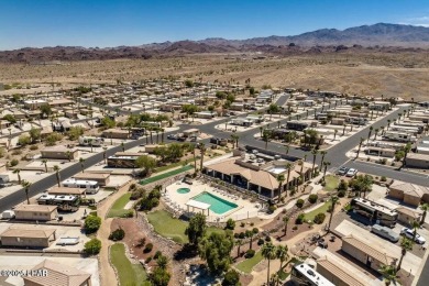 Beautiful park model has an addition added to it, giving you on The Refuge Golf and Country Club in Arizona - for sale on GolfHomes.com, golf home, golf lot