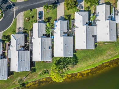 A peaceful waterfront gem wrapped in Florida charm.
Step into on Plantation Golf and Country Club in Florida - for sale on GolfHomes.com, golf home, golf lot