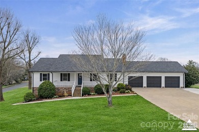 Welcome to luxury living in the highly sought-after Woodbridge on Woodbridge Golf Links in North Carolina - for sale on GolfHomes.com, golf home, golf lot