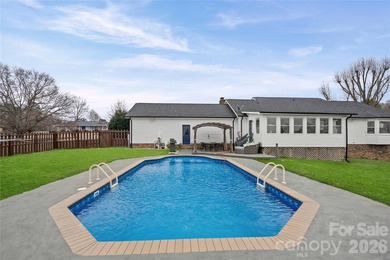 Welcome to luxury living in the highly sought-after Woodbridge on Woodbridge Golf Links in North Carolina - for sale on GolfHomes.com, golf home, golf lot