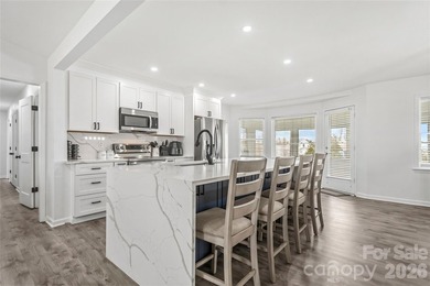 Welcome to luxury living in the highly sought-after Woodbridge on Woodbridge Golf Links in North Carolina - for sale on GolfHomes.com, golf home, golf lot