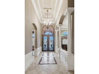 Situated on 1.85 acres along the Kinderlou Forest golf course on Kinderlou Forest Golf Club in Georgia - for sale on GolfHomes.com, golf home, golf lot