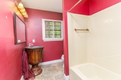 Welcome to 106 Tam O'Shanter Court -- a charming 2-bedroom on Diamondhead Golf and Country Club in Arkansas - for sale on GolfHomes.com, golf home, golf lot