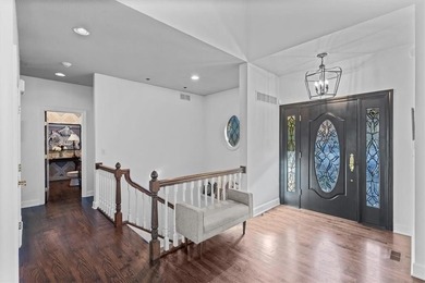 Welcome to 16750 S Village Drive, an elegant 4-bedroom, 2.5-bath on Loch Lloyd Country Club in Missouri - for sale on GolfHomes.com, golf home, golf lot