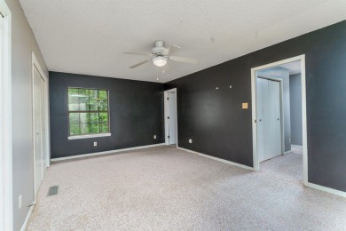 Welcome to 106 Tam O'Shanter Court -- a charming 2-bedroom on Diamondhead Golf and Country Club in Arkansas - for sale on GolfHomes.com, golf home, golf lot