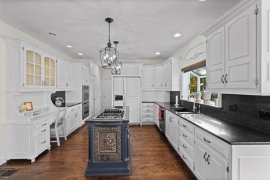 Welcome to 16750 S Village Drive, an elegant 4-bedroom, 2.5-bath on Loch Lloyd Country Club in Missouri - for sale on GolfHomes.com, golf home, golf lot