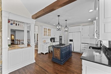 Welcome to 16750 S Village Drive, an elegant 4-bedroom, 2.5-bath on Loch Lloyd Country Club in Missouri - for sale on GolfHomes.com, golf home, golf lot