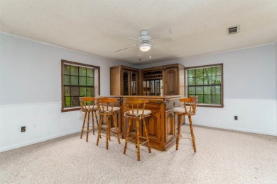 Welcome to 106 Tam O'Shanter Court -- a charming 2-bedroom on Diamondhead Golf and Country Club in Arkansas - for sale on GolfHomes.com, golf home, golf lot
