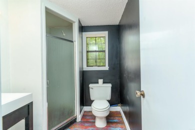 Welcome to 106 Tam O'Shanter Court -- a charming 2-bedroom on Diamondhead Golf and Country Club in Arkansas - for sale on GolfHomes.com, golf home, golf lot