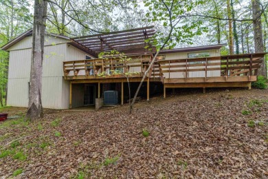Welcome to 106 Tam O'Shanter Court -- a charming 2-bedroom on Diamondhead Golf and Country Club in Arkansas - for sale on GolfHomes.com, golf home, golf lot