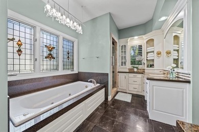 Welcome to 16750 S Village Drive, an elegant 4-bedroom, 2.5-bath on Loch Lloyd Country Club in Missouri - for sale on GolfHomes.com, golf home, golf lot