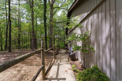 Welcome to 106 Tam O'Shanter Court -- a charming 2-bedroom on Diamondhead Golf and Country Club in Arkansas - for sale on GolfHomes.com, golf home, golf lot
