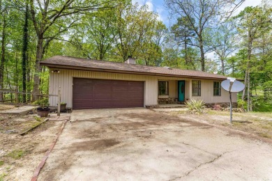 Welcome to 106 Tam O'Shanter Court -- a charming 2-bedroom on Diamondhead Golf and Country Club in Arkansas - for sale on GolfHomes.com, golf home, golf lot